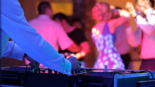 Grooving to the Beats: Unveiling the Ultimate Wedding DJ Guide